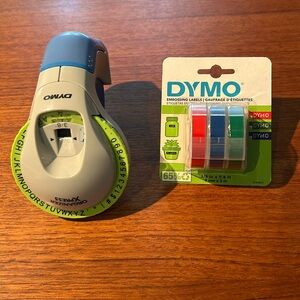 Dymo Organizer Xpress embossed label maker, 3/8” next to new w extra labels